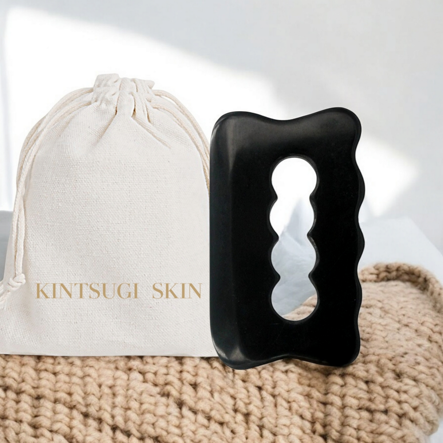 GUA SHA BIAN STONE for the face.
