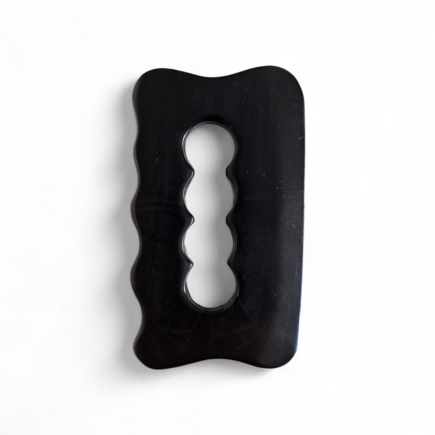 GUA SHA BIAN STONE for the body.