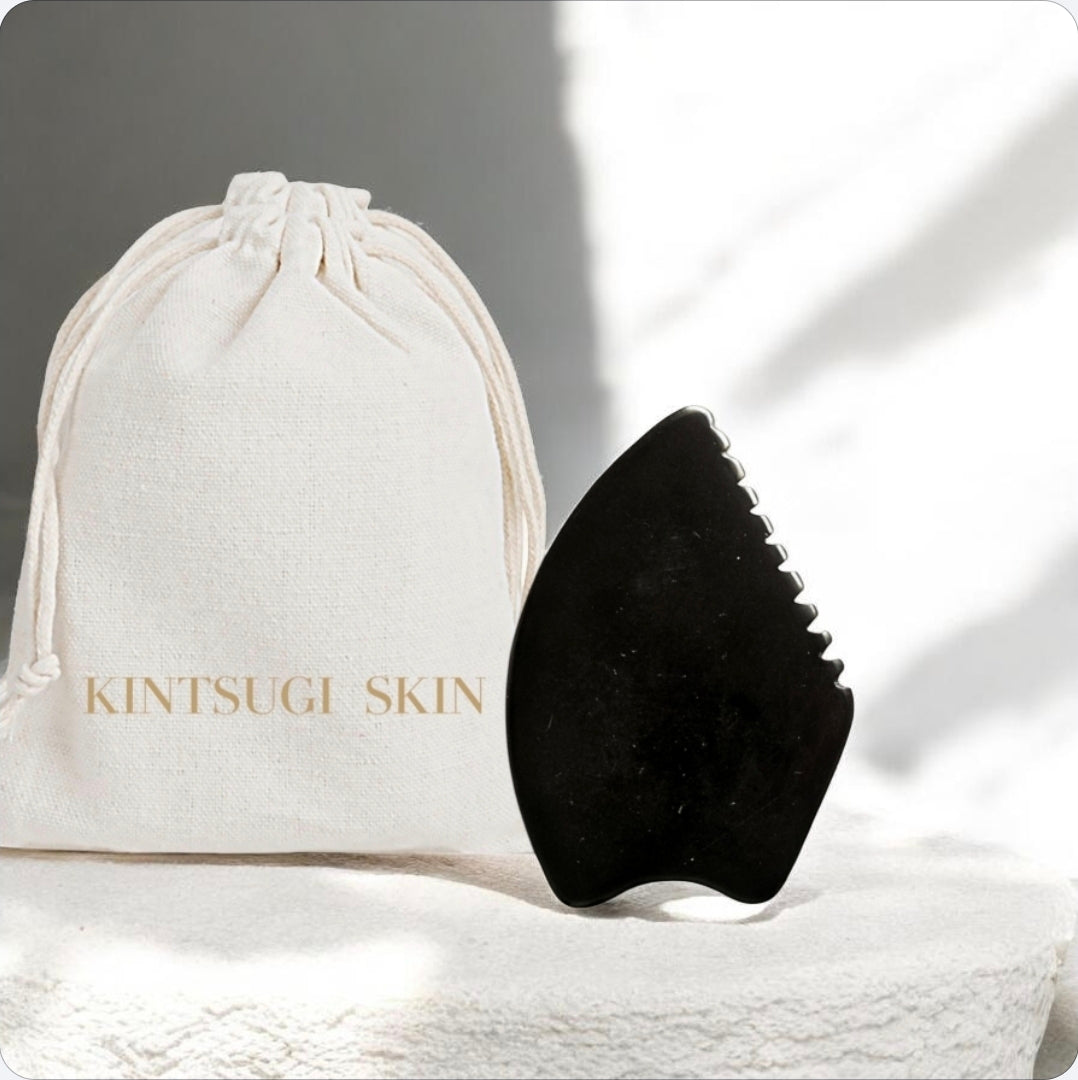 GUA SHA BIAN STONE for the face.